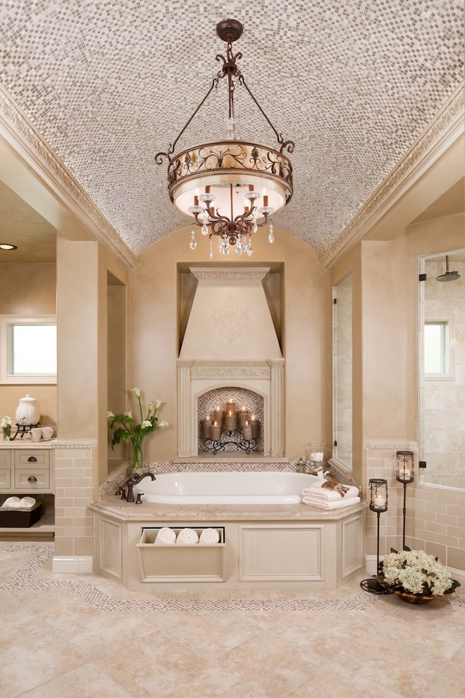 Large traditional master bathroom in Houston with mosaic tile, beaded inset cabinets, beige cabinets, a drop-in tub, beige tile, beige walls, travertine floors and beige floor.