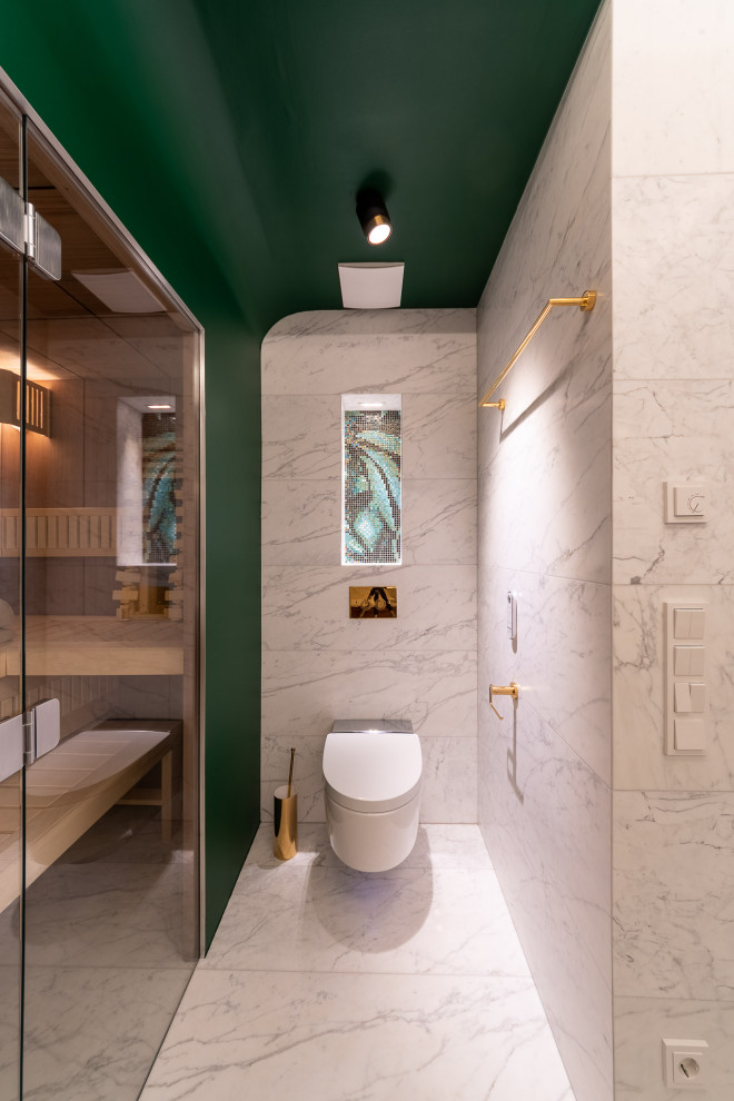 Inspiration for a mid-sized contemporary bathroom in Munich with dark wood cabinets, an alcove shower, a two-piece toilet, white tile, marble, white walls, marble floors, with a sauna, a vessel sink, white floor, white benchtops, a shower seat, a single vanity, wood benchtops and a freestanding vanity.