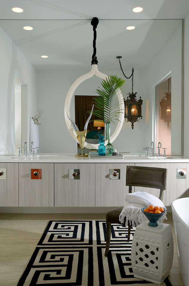 Midcentury bathroom in Los Angeles with flat-panel cabinets and grey cabinets.