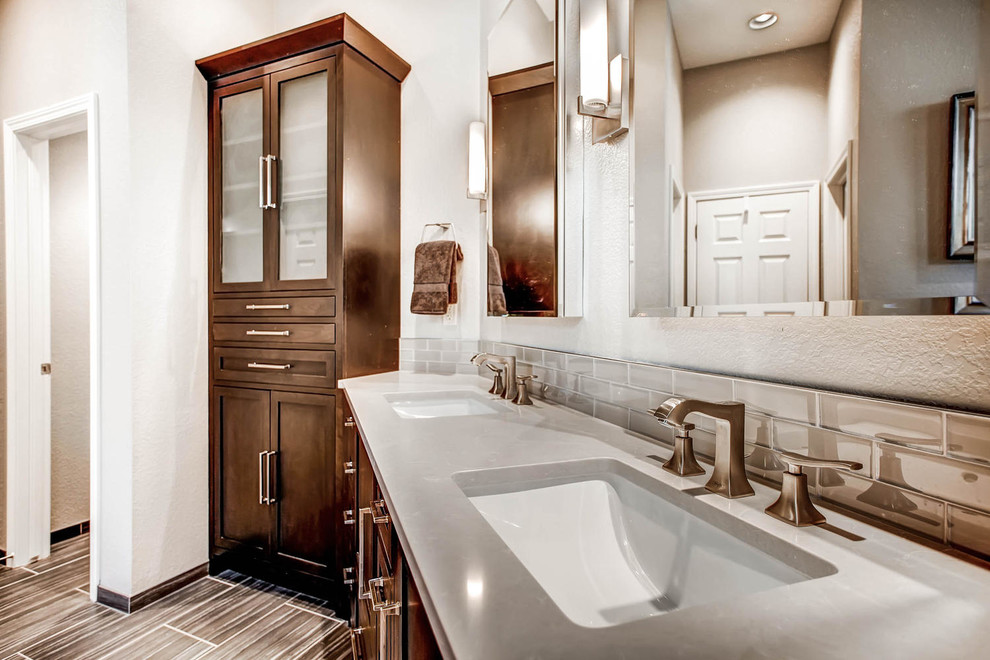 Expansive contemporary master bathroom in Denver with an undermount sink, shaker cabinets, dark wood cabinets, engineered quartz benchtops, a corner shower, a two-piece toilet, beige tile, ceramic tile, beige walls and ceramic floors.