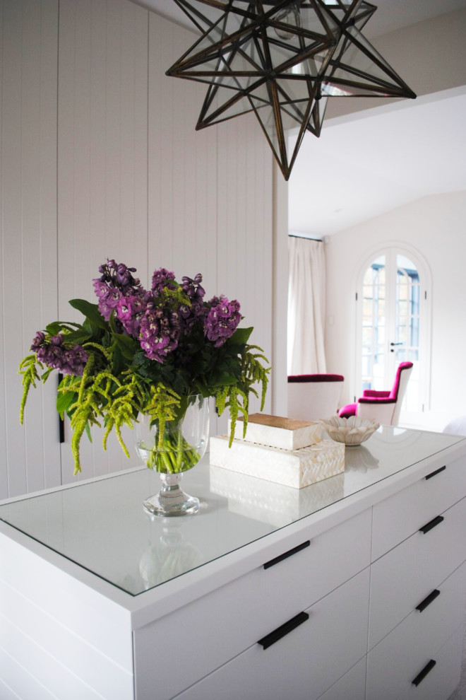 Photo of a contemporary storage and wardrobe in Sydney.