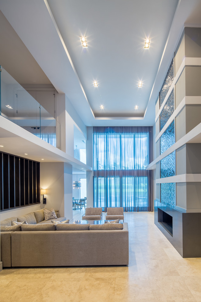 This is an example of an expansive contemporary formal open concept living room in Miami with grey walls, marble floors, a ribbon fireplace, a tile fireplace surround, no tv and grey floor.