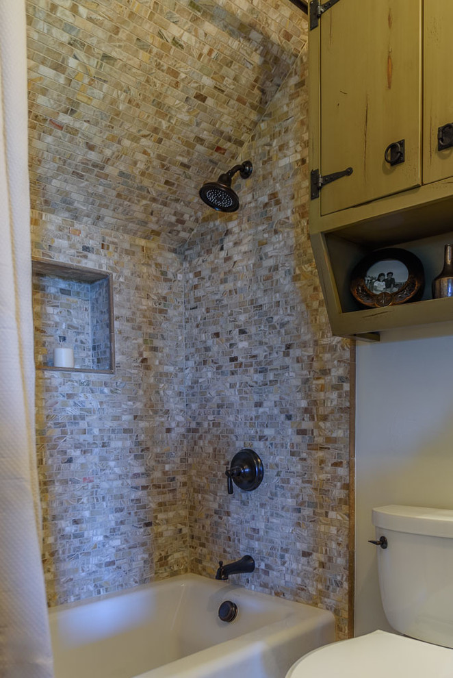 Example of a mountain style home design design in Austin