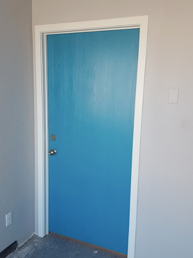Inspiration for a small transitional front door remodel in Denver with gray walls and a blue front door