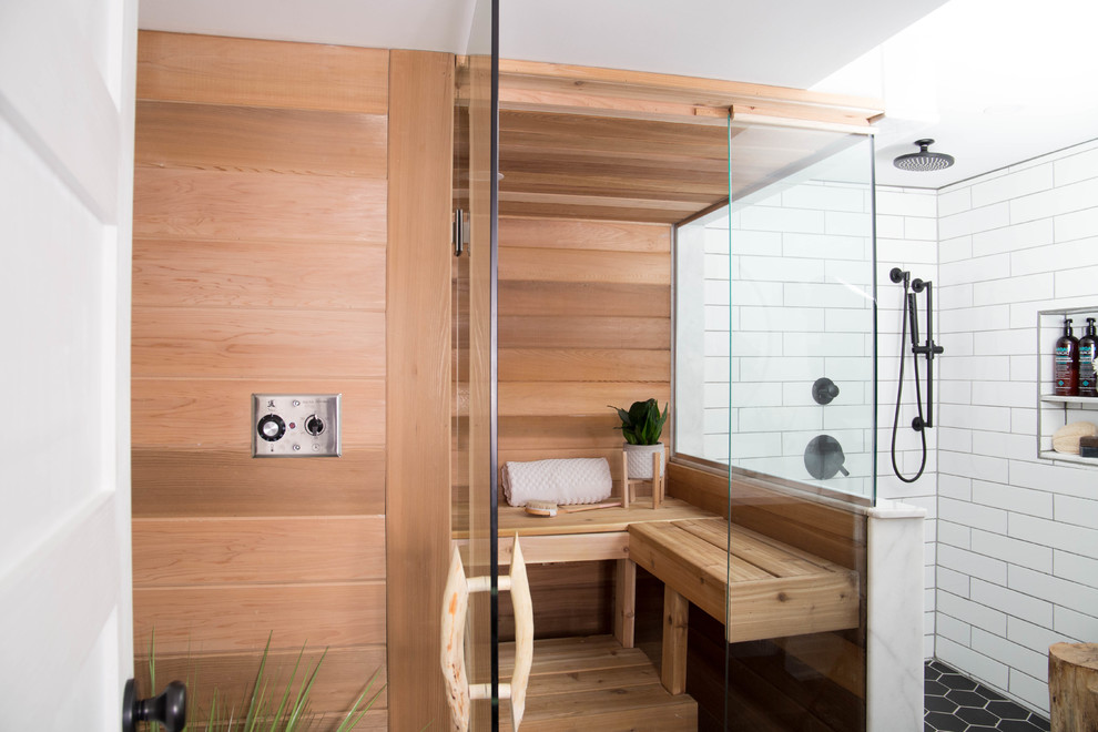 This is an example of a small modern bathroom in Toronto with flat-panel cabinets, medium wood cabinets, an alcove shower, a one-piece toilet, white walls, ceramic floors, with a sauna, an integrated sink, engineered quartz benchtops, black floor and an open shower.