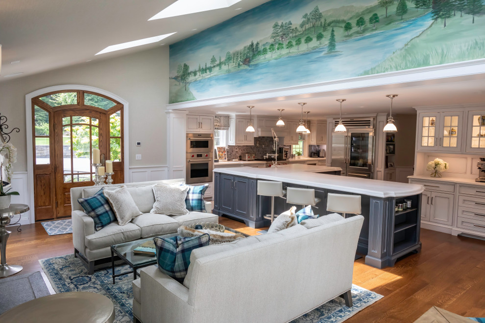 Design ideas for a mid-sized beach style open concept family room in Bridgeport with grey walls, medium hardwood floors, a standard fireplace, a stone fireplace surround, a wall-mounted tv, brown floor, wallpaper and wallpaper.