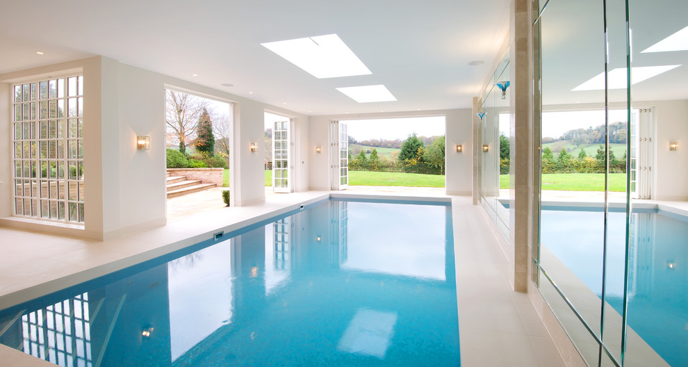 Photo of a contemporary indoor rectangular pool in Cheshire.