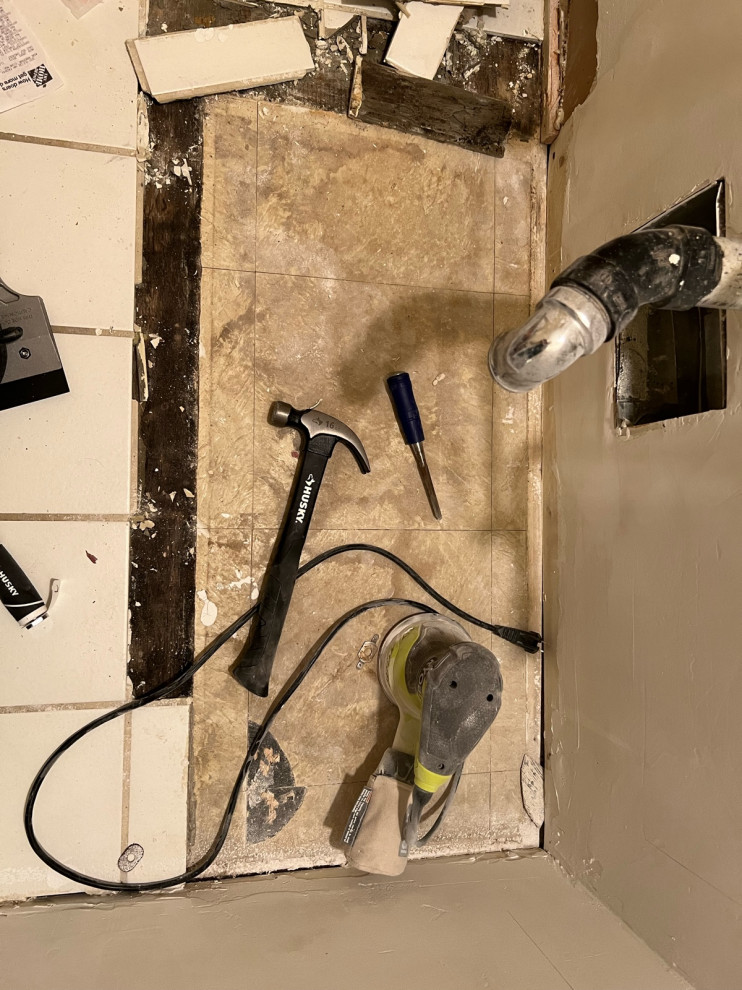 Removing ceramic tiles laid on top of old asbestos black mastic