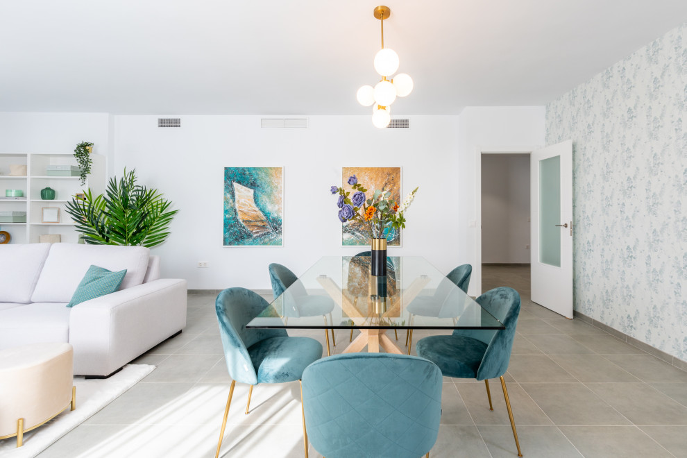 Ejemplo de comedor contemporáneo extra grande con paredes blancas, suelo de baldosas de porcelana, suelo gris y cuadros