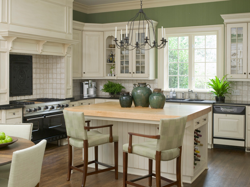 Design ideas for a large traditional eat-in kitchen in Atlanta with a double-bowl sink, glass-front cabinets, white cabinets, onyx benchtops, white splashback, stainless steel appliances, dark hardwood floors and with island.