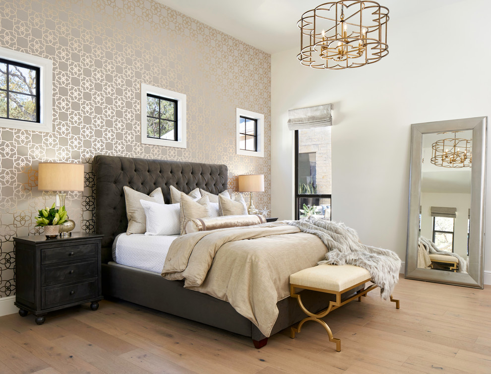 Design ideas for a transitional master bedroom in Austin with beige walls, light hardwood floors and beige floor.