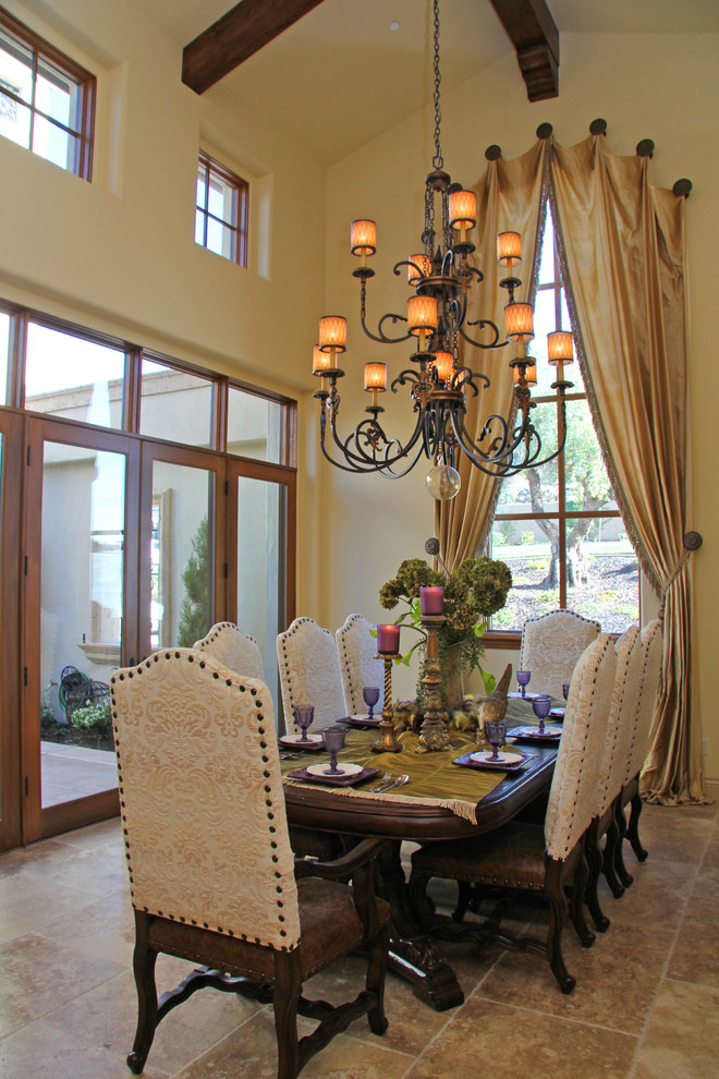 This is an example of a mediterranean dining room in Sacramento with beige walls.