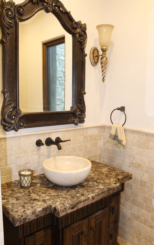 Mid-sized contemporary 3/4 bathroom in San Luis Obispo with a vessel sink, marble benchtops and stone tile.