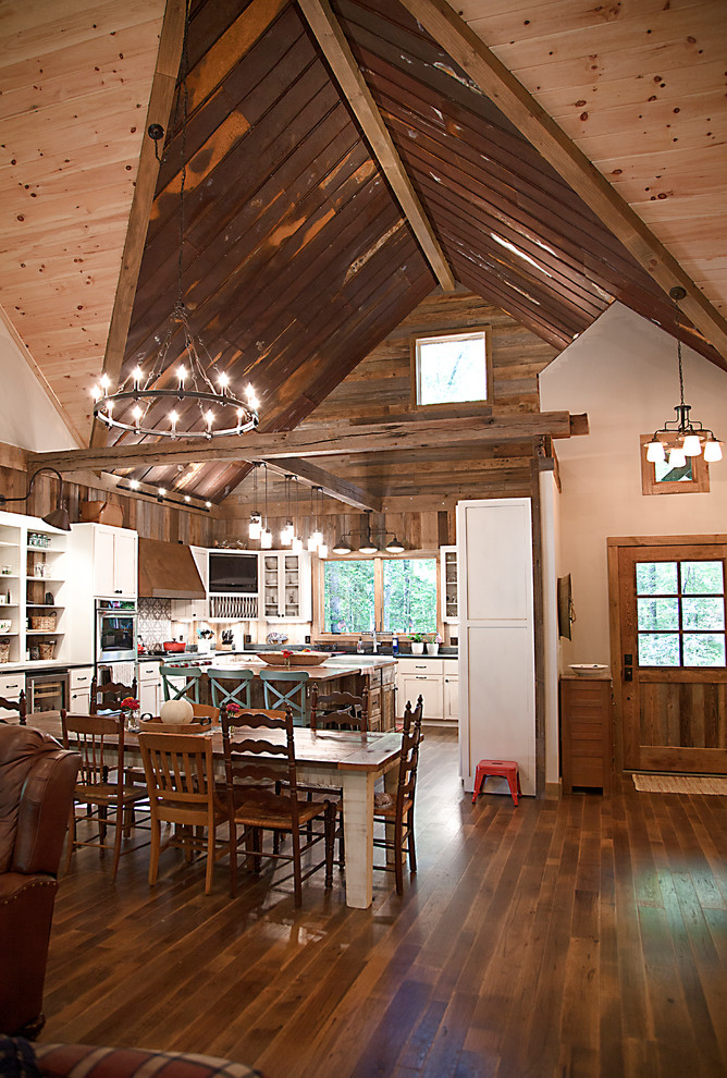 Example of a large mountain style kitchen design with an island
