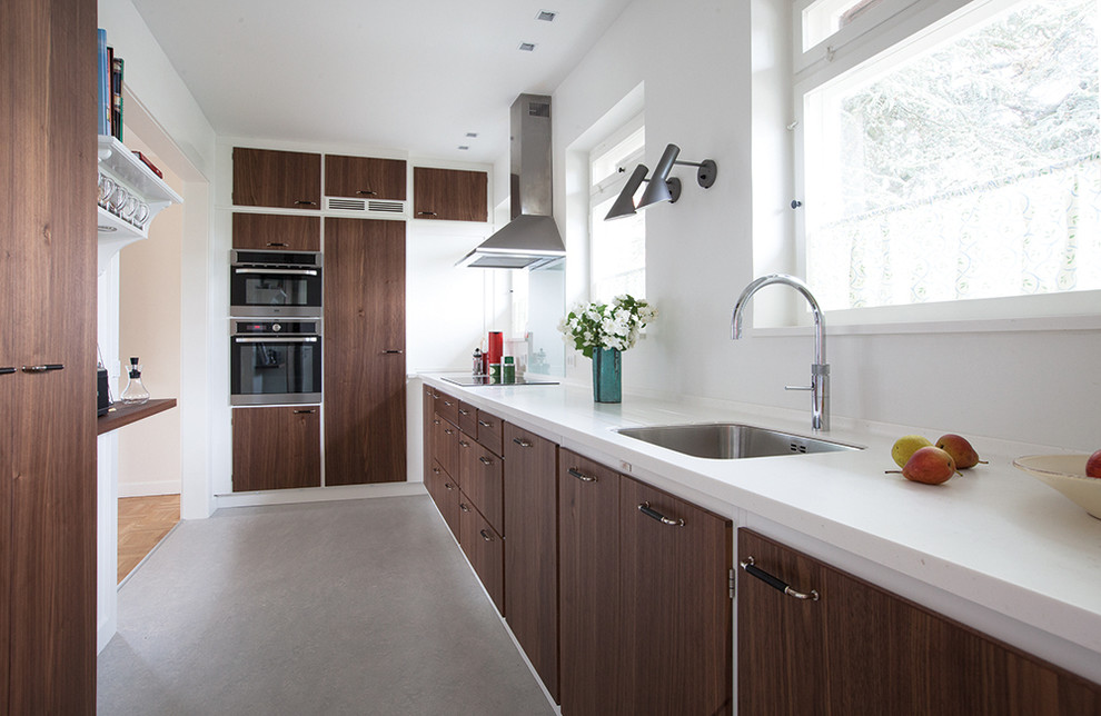 This is an example of a mid-sized scandinavian kitchen in Copenhagen.
