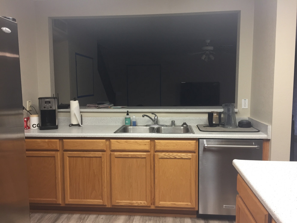 Example of a mid-sized transitional gray floor kitchen design in Phoenix with an island