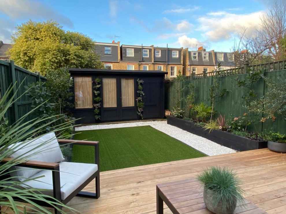 Inspiration for a small modern backyard formal garden in London.