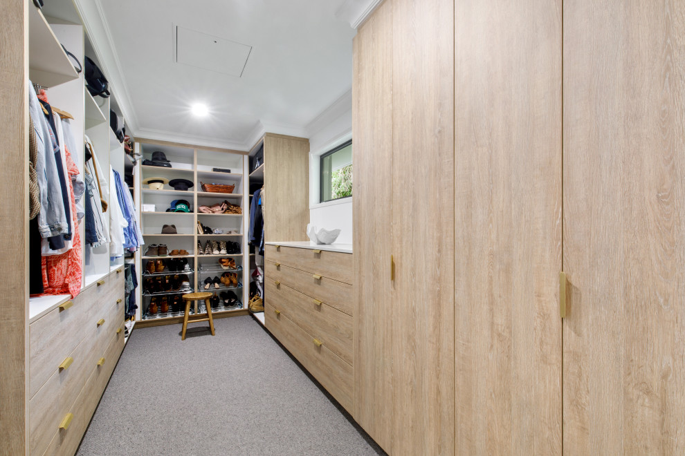 Inspiration for a modern storage and wardrobe in Sunshine Coast.