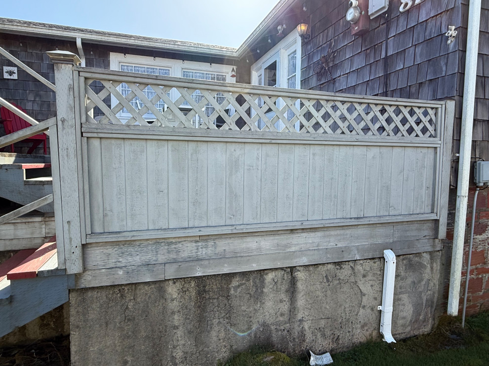 Example of a beach style deck design in Seattle