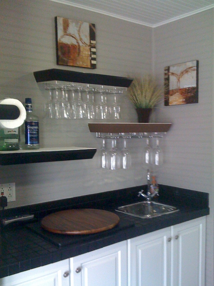 Inspiration for a contemporary home bar in Miami.