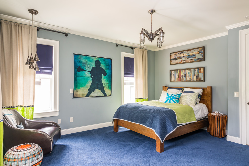 This is an example of a mid-sized transitional kids' room for boys in Atlanta with blue walls, carpet and blue floor.