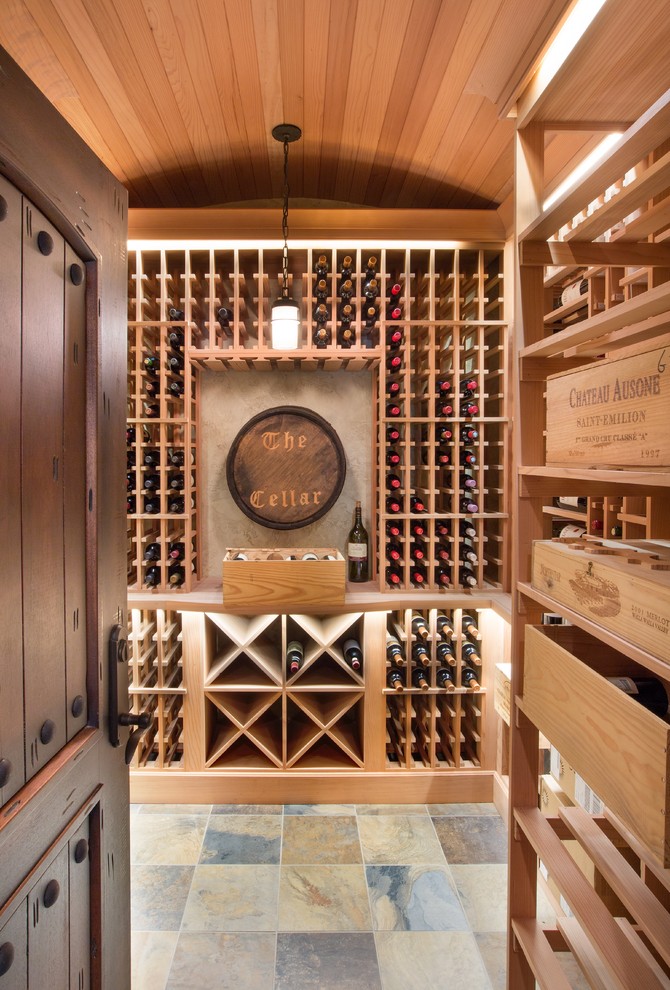 This is an example of a traditional wine cellar in Columbus with storage racks.