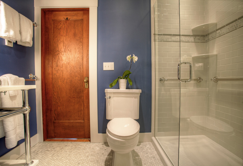 Design ideas for a small arts and crafts 3/4 bathroom in Seattle with furniture-like cabinets, an open shower, a two-piece toilet, white tile, subway tile, blue walls, marble floors, a console sink and marble benchtops.