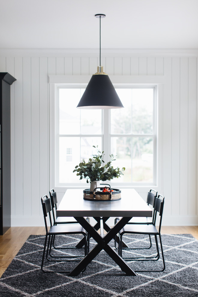 Example of a transitional dining room design in Chicago