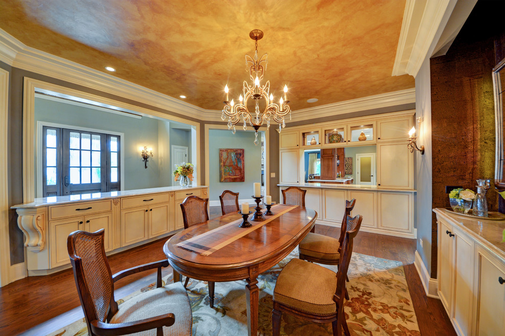Photo of a large traditional separate dining room in Chicago with medium hardwood floors.