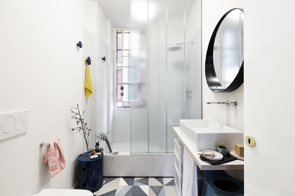 Design ideas for a scandinavian 3/4 bathroom in Milan with open cabinets, white tile, white walls, white benchtops, an alcove shower, a vessel sink and wood benchtops.