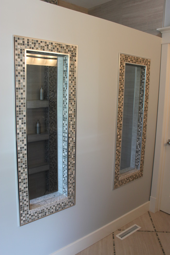 Example of a large transitional master gray tile porcelain tile doorless shower design with blue walls