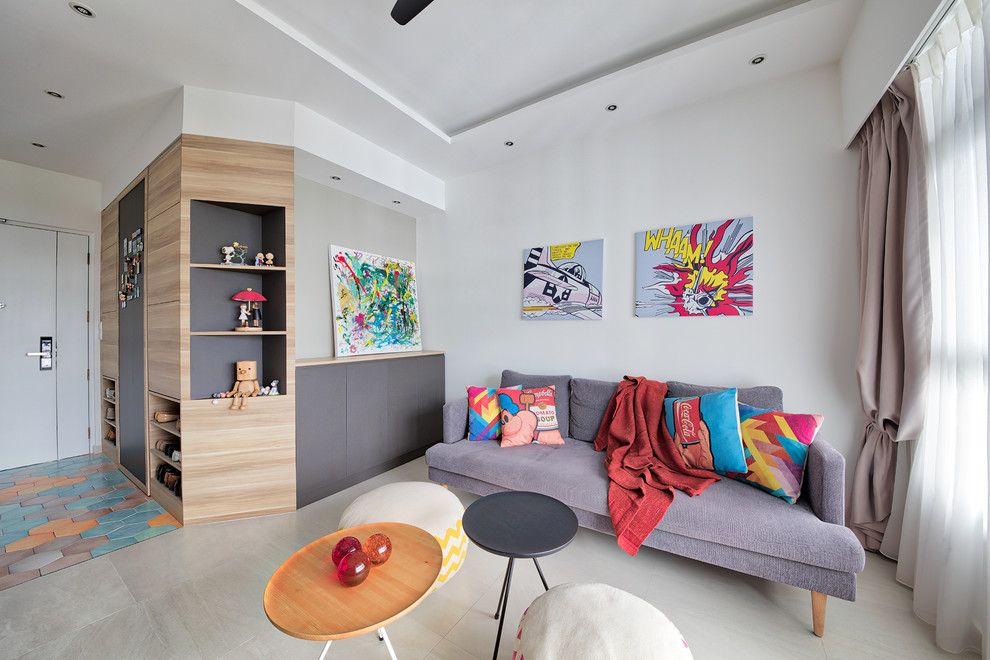 Contemporary open concept living room in Singapore with white walls and grey floor.