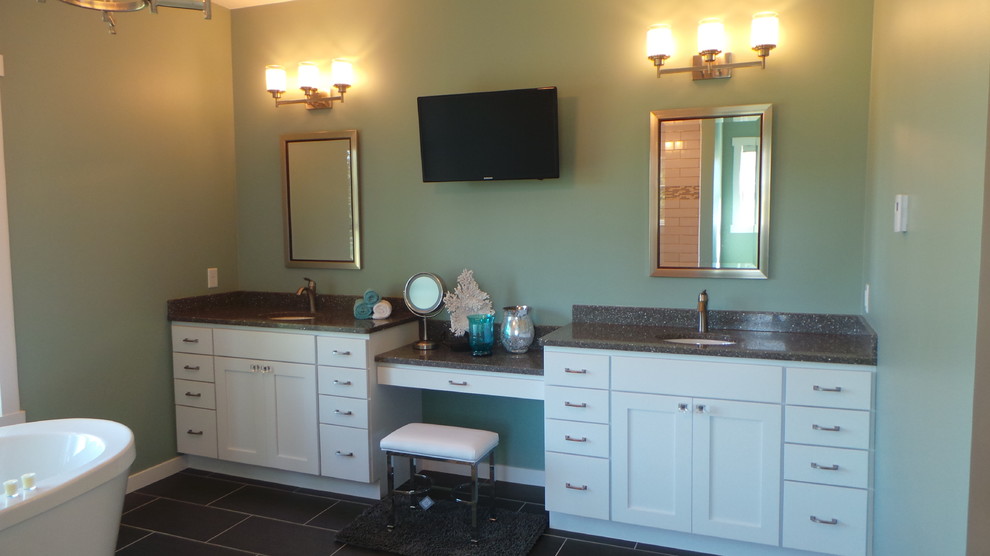 This is an example of an expansive arts and crafts master bathroom in Other with an undermount sink, shaker cabinets, white cabinets, engineered quartz benchtops, a freestanding tub, an open shower, black tile, porcelain tile, blue walls and porcelain floors.