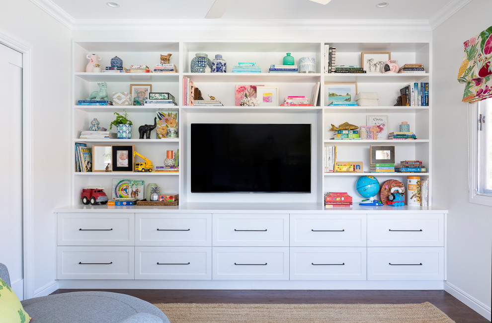 Design ideas for a mid-sized gender-neutral kids' playroom for kids 4-10 years old in Brisbane with white walls, dark hardwood floors and brown floor.