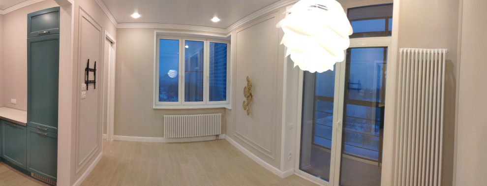 Mid-sized contemporary formal enclosed living room in Moscow with beige walls, laminate floors, no fireplace, a wall-mounted tv and beige floor.