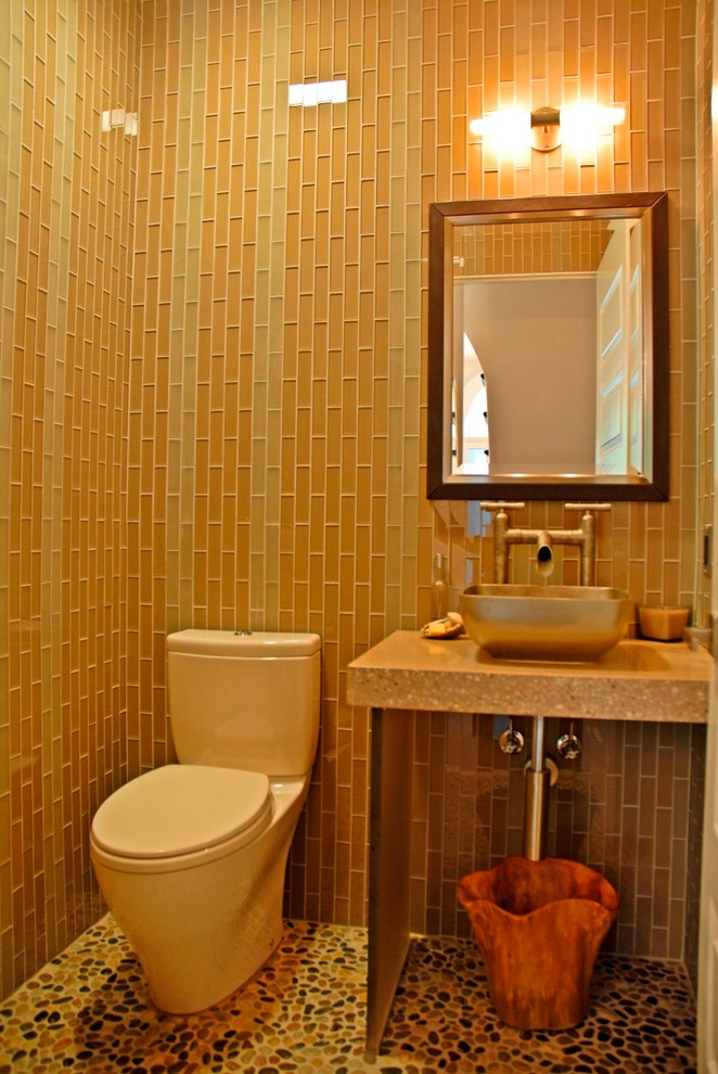 Example of an eclectic glass sheet bathroom design in New York