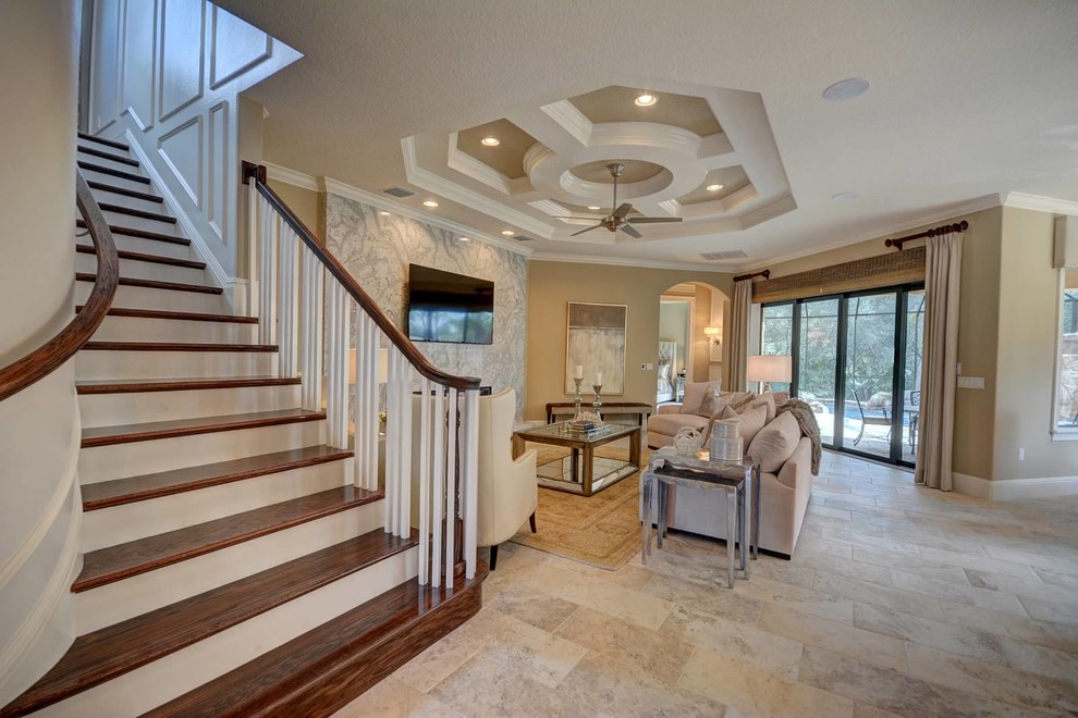 Mediterranean l-shaped staircase in Miami with wood risers and wood railing.