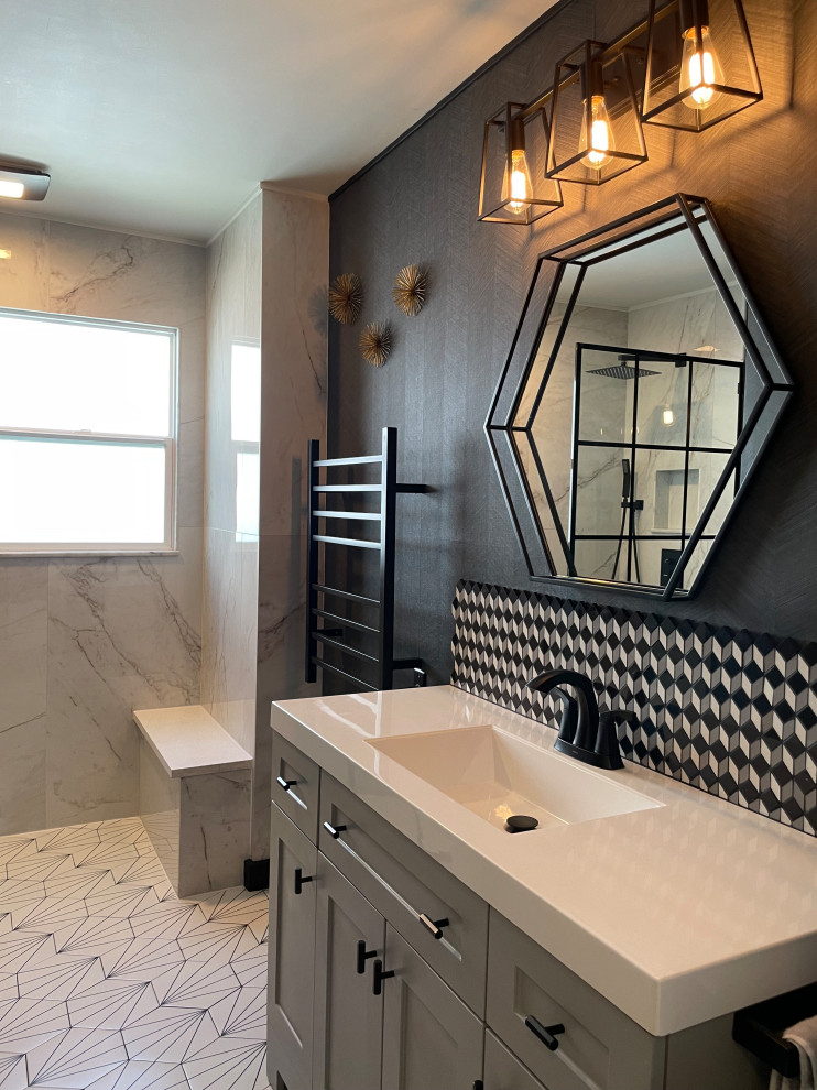 Small contemporary 3/4 bathroom in Seattle with shaker cabinets, grey cabinets, a curbless shower, black and white tile, stone tile, solid surface benchtops, white benchtops, a single vanity and a built-in vanity.