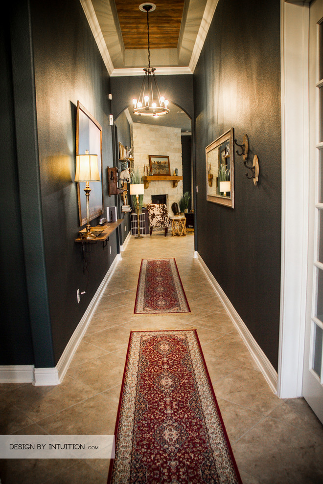 Example of a large mountain style foyer design in Houston