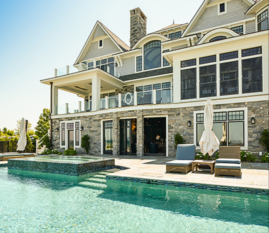 Hot tub - large transitional backyard stone and custom-shaped natural hot tub idea