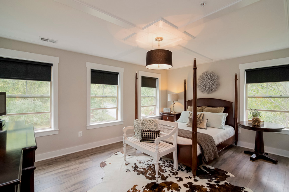 Design ideas for a mid-sized country master bedroom in Baltimore with grey walls and medium hardwood floors.