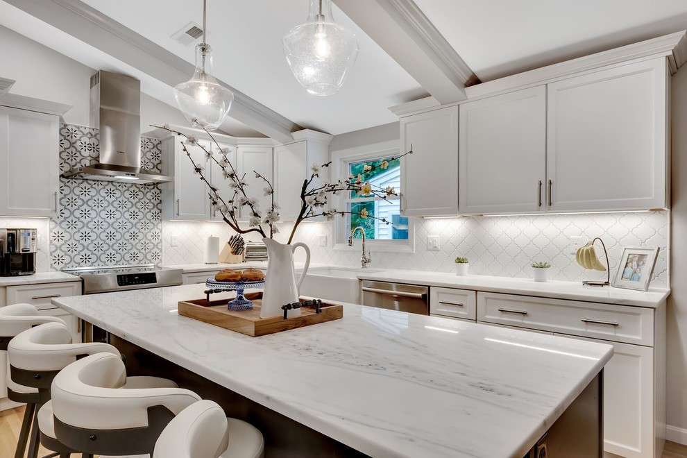 Transitional light wood floor eat-in kitchen photo in Boston with an island
