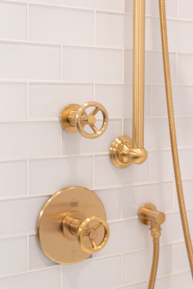 Golden Shower Head in Modern Bathroom with Tiled Walls