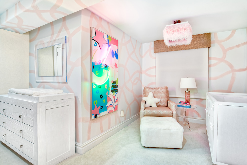 This is an example of a mid-sized modern kids' room for girls in New York with pink walls, carpet and white floor.