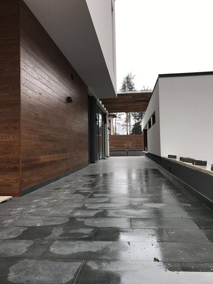 Дом в Ленинградской области. Отделка фасадов термоясенем.