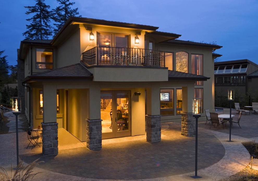 Example of a transitional backyard deck design in Seattle with a fire pit