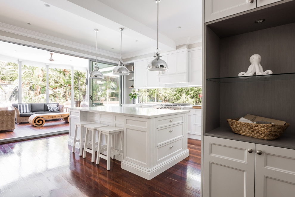 Inspiration for a mid-sized l-shaped eat-in kitchen in Perth with a single-bowl sink, shaker cabinets, white cabinets, quartz benchtops, white splashback, window splashback, medium hardwood floors and with island.