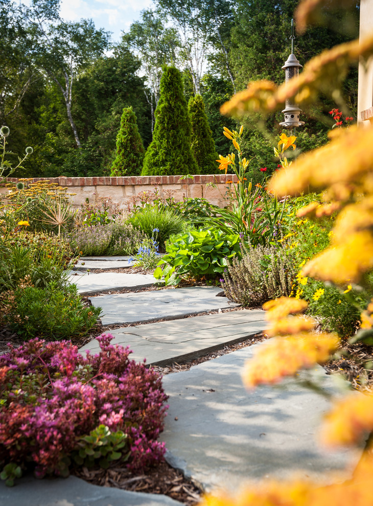 Photo of a large rustic full sun front yard landscaping.