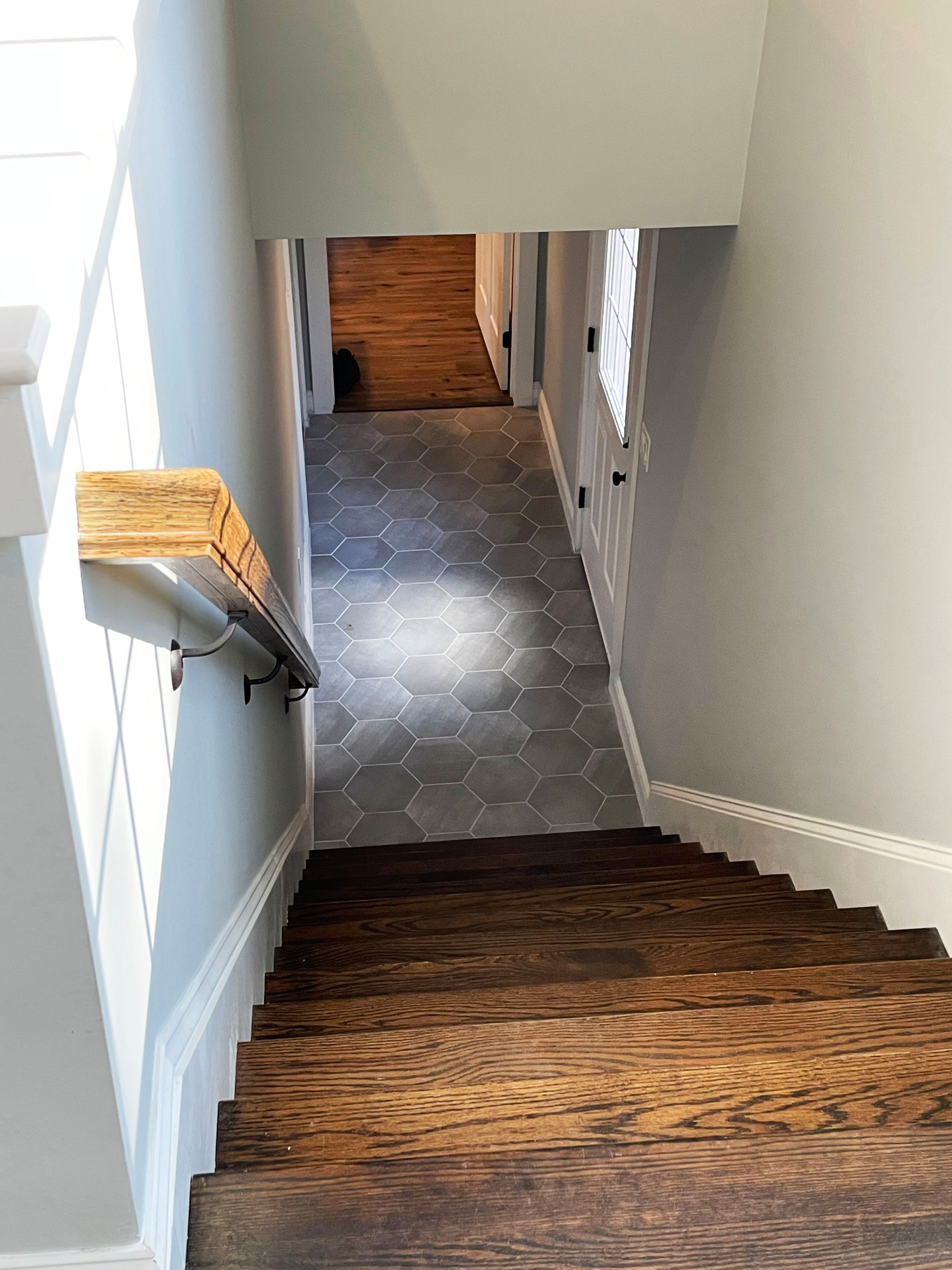 Stairs to lower level of home and in law spaces