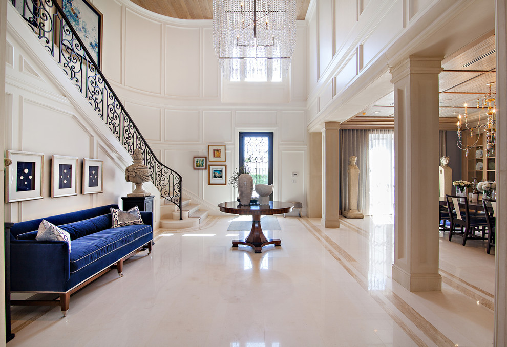 Huge transitional single front door photo in Miami with white walls and a black front door